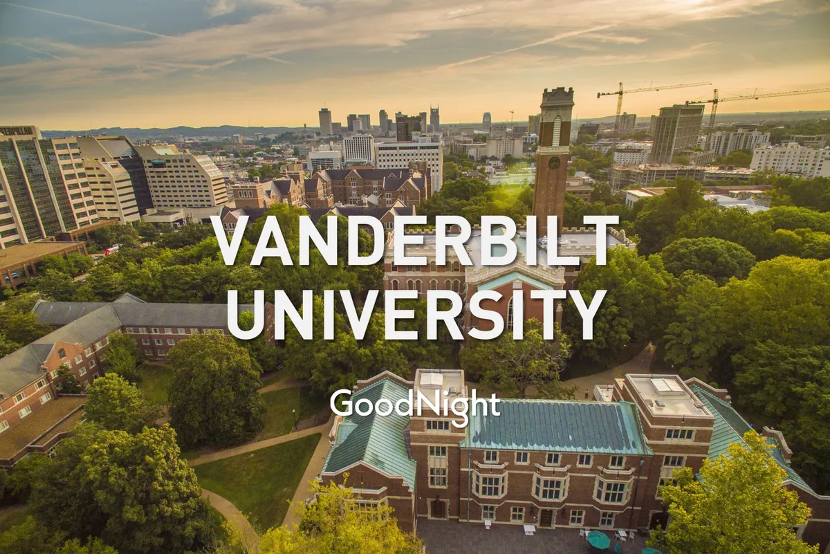 A panoramic view of Vanderbilt University’s iconic clock tower, surrounded by lush greenery and the Nashville skyline in the background. The scene is calm and academic, perfect for capturing the ease of access to local institutions and the city’s central business district.